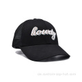 Bestickte schwarze Trucker -Kappe